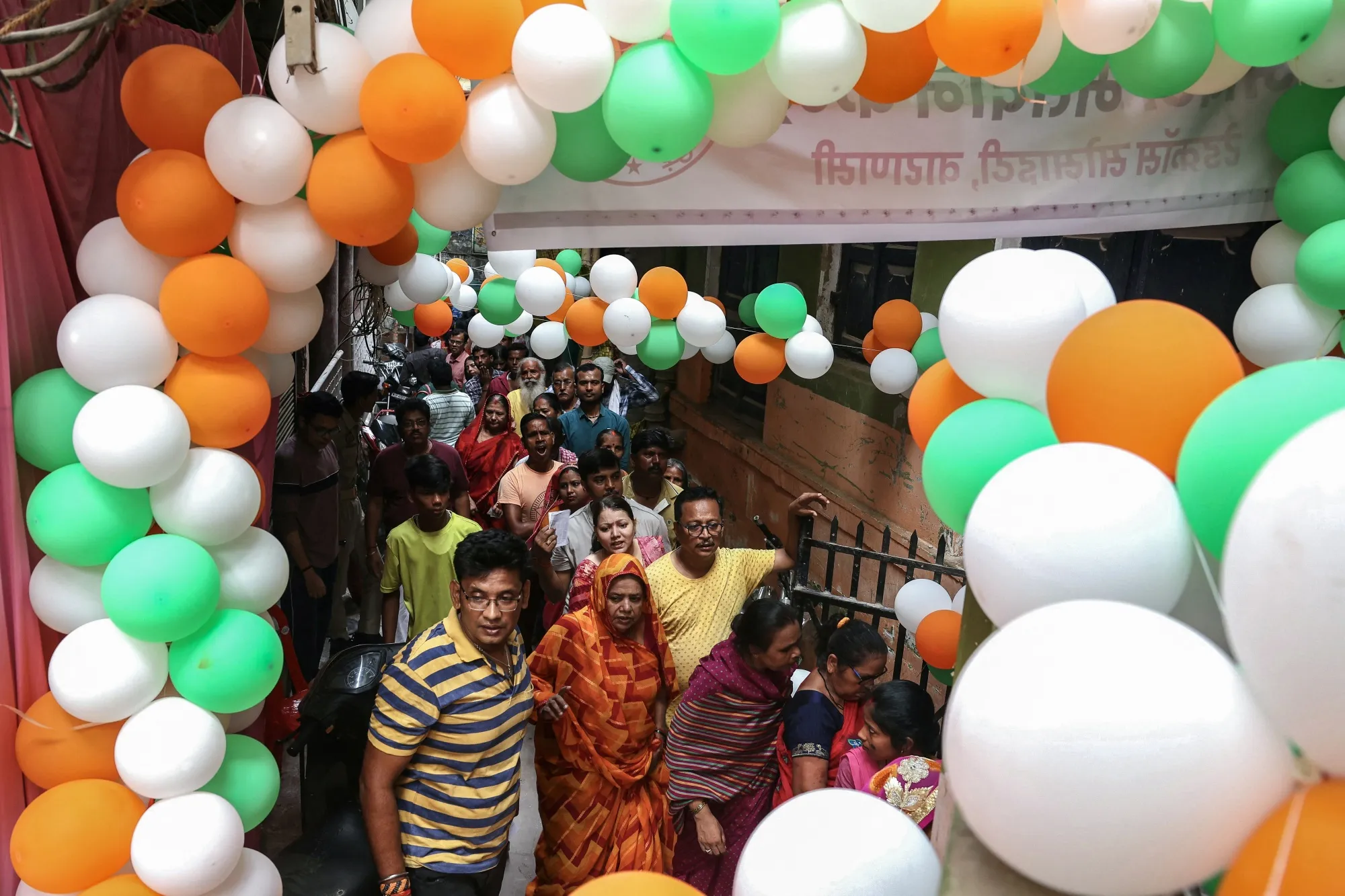 Voters queue up to cast their ballots at a polling station in Varanasi, India,&nbsp;on June 1.