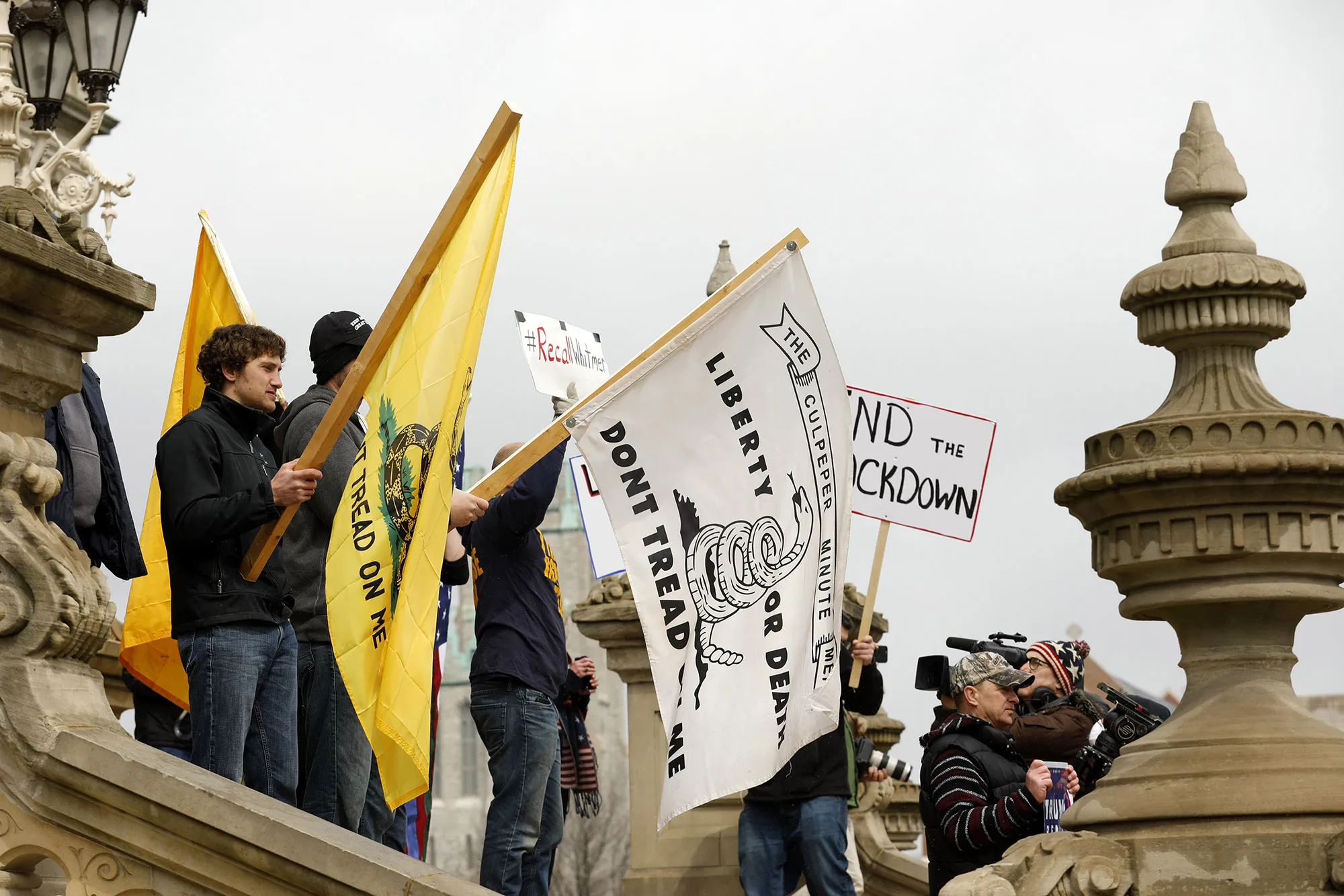 People protest against the quarantine at the Michigan State Capitol in Lansing, Michigan on April 15.
