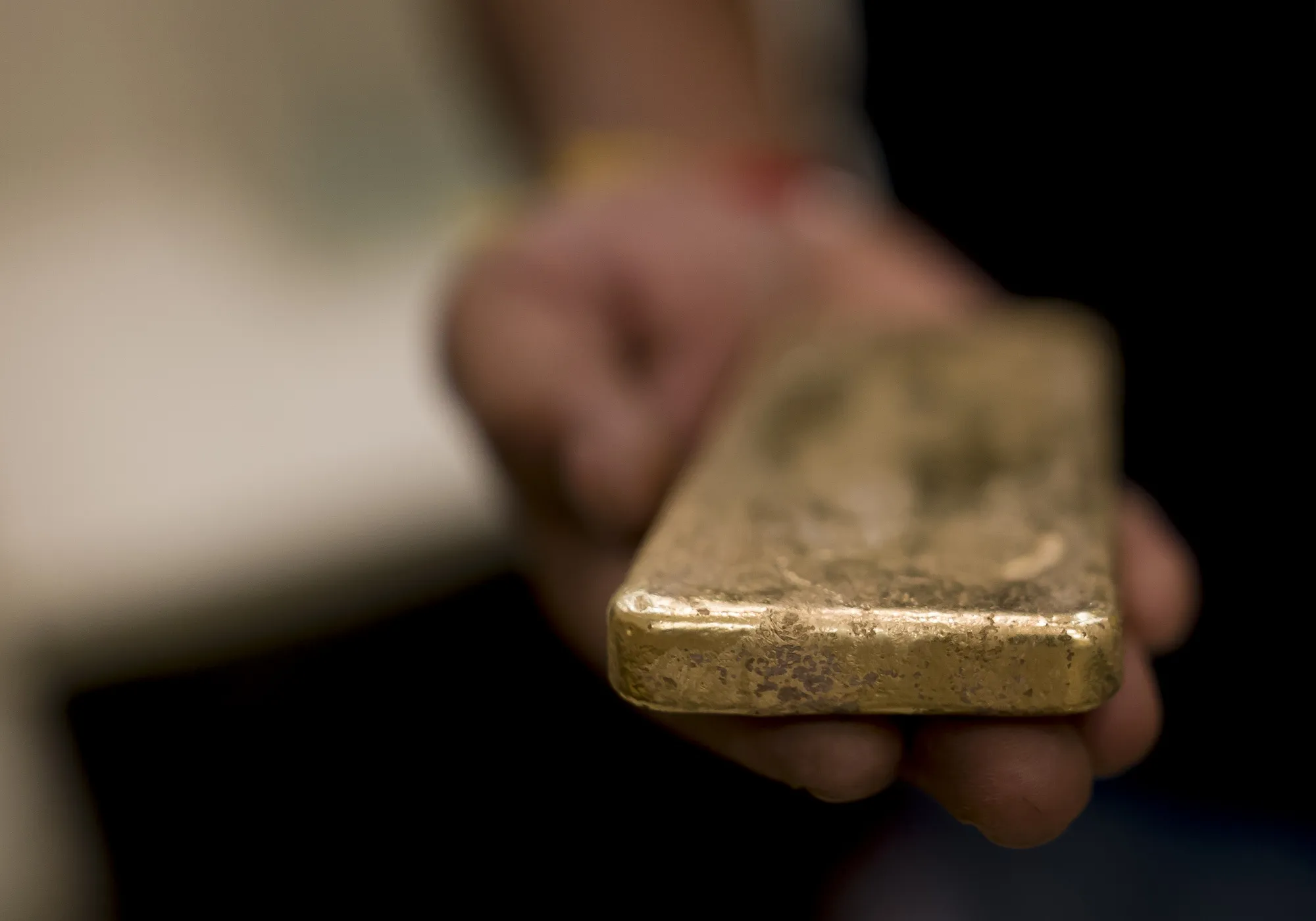 A worker holds a gold bar converted from the personal jewelry at a verification center operated by MMTC-PAMP India Pvt. Ltd. in New Delhi, India, on Friday, Sept. 2, 2022. Indians will celebrate Dussehra, Diwali and Dhanteras in October, when buying gold is considered favorable; following these festivals is Indian wedding season, a major driver of gold purchases.
