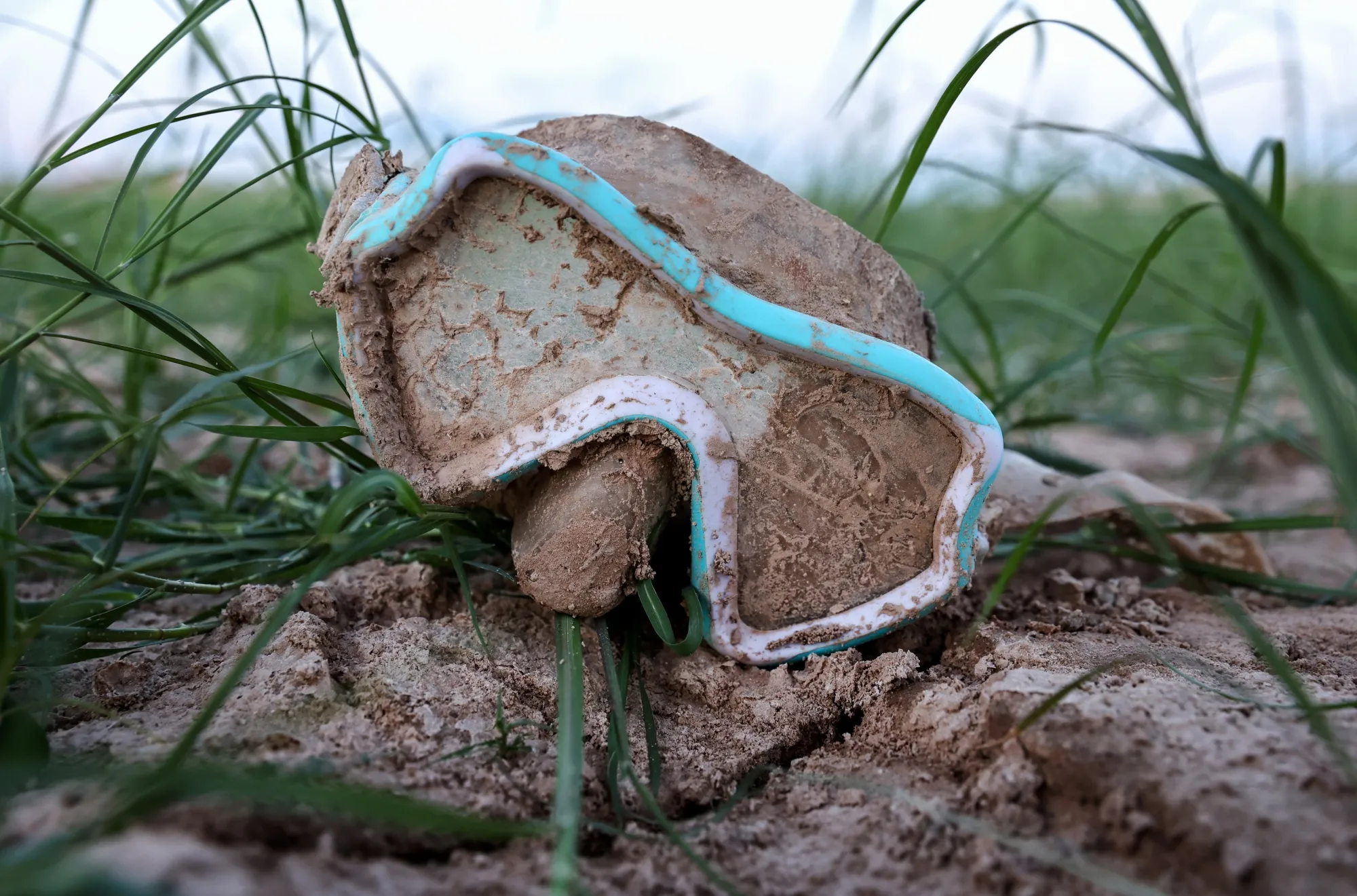 A formerly submerged swim mask sits in a dry section Lake Mead on June 23&nbsp;in Nevada.&nbsp;