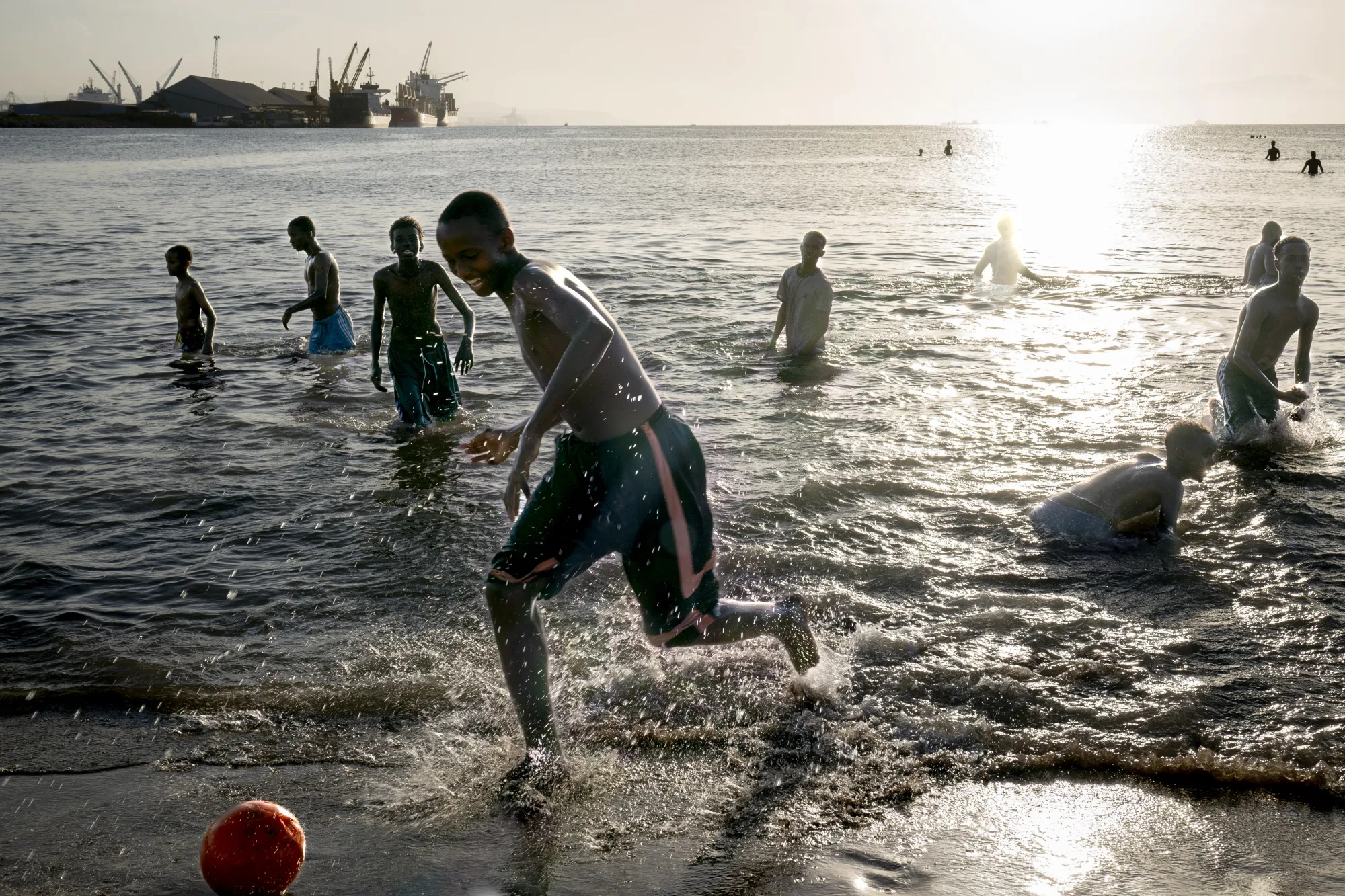 A Djibouti beach at sunset on April 18. One of the country’s many port facilities can be seen in the distance.