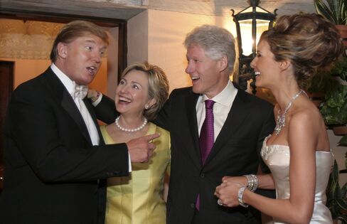 Newlyweds Donald Trump Sr. and Melania Trump with Hillary Rodham Clinton and Bill Clinton at their reception held at The Mar-a-Lago Club in January 22, 2005 in Palm Beach, Florida.