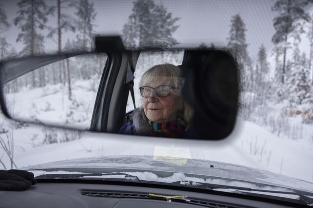 Birgitta Velander drives through her forest outside of Sundsvall. Velander inherited her land and recently logged a small plot to benefit from the high price of timber.