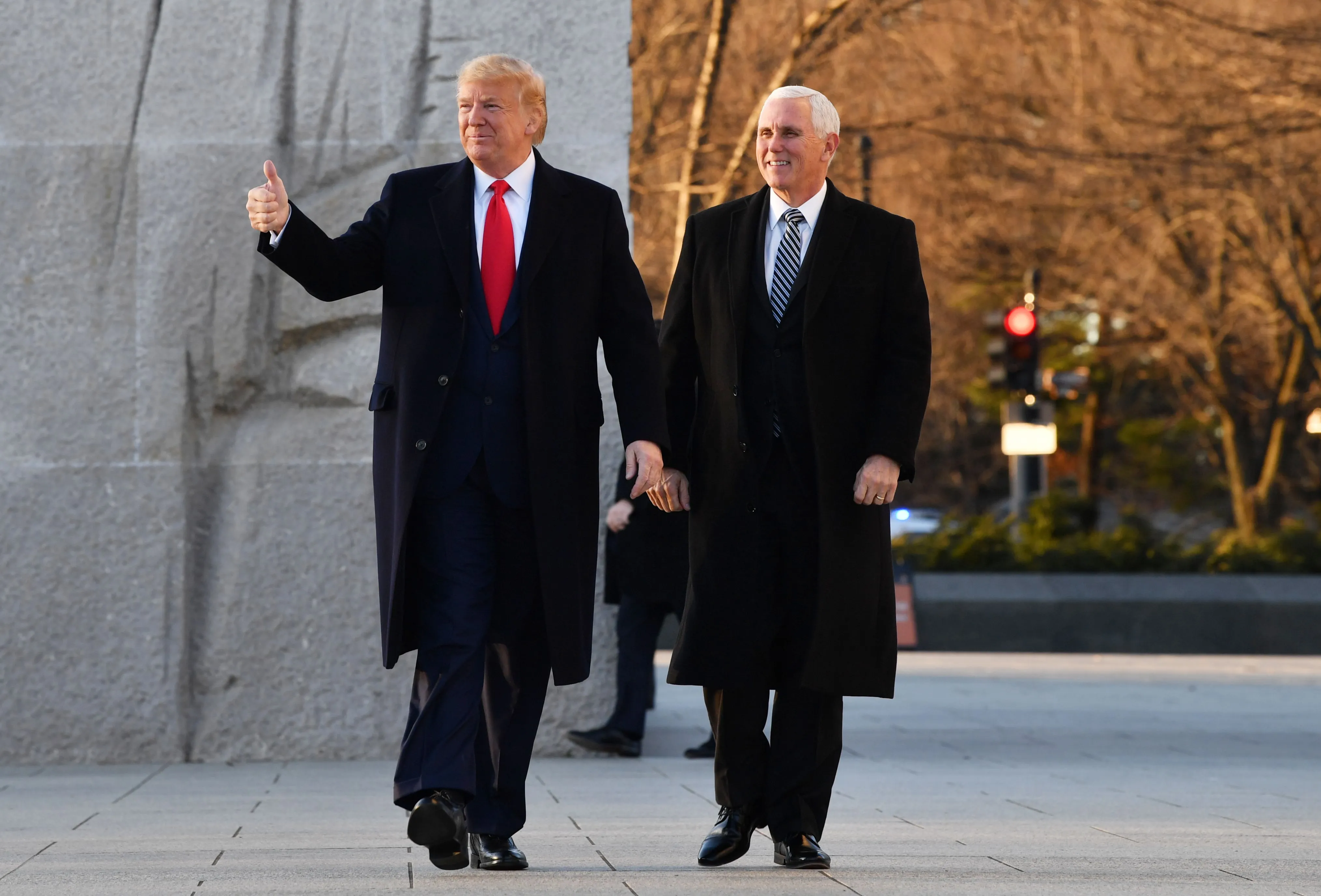 President Donald Trump and Vice President Mike Pence arrive at the Martin Luther King Jr. memorial on MLK day in Washington, on Jan. 20.