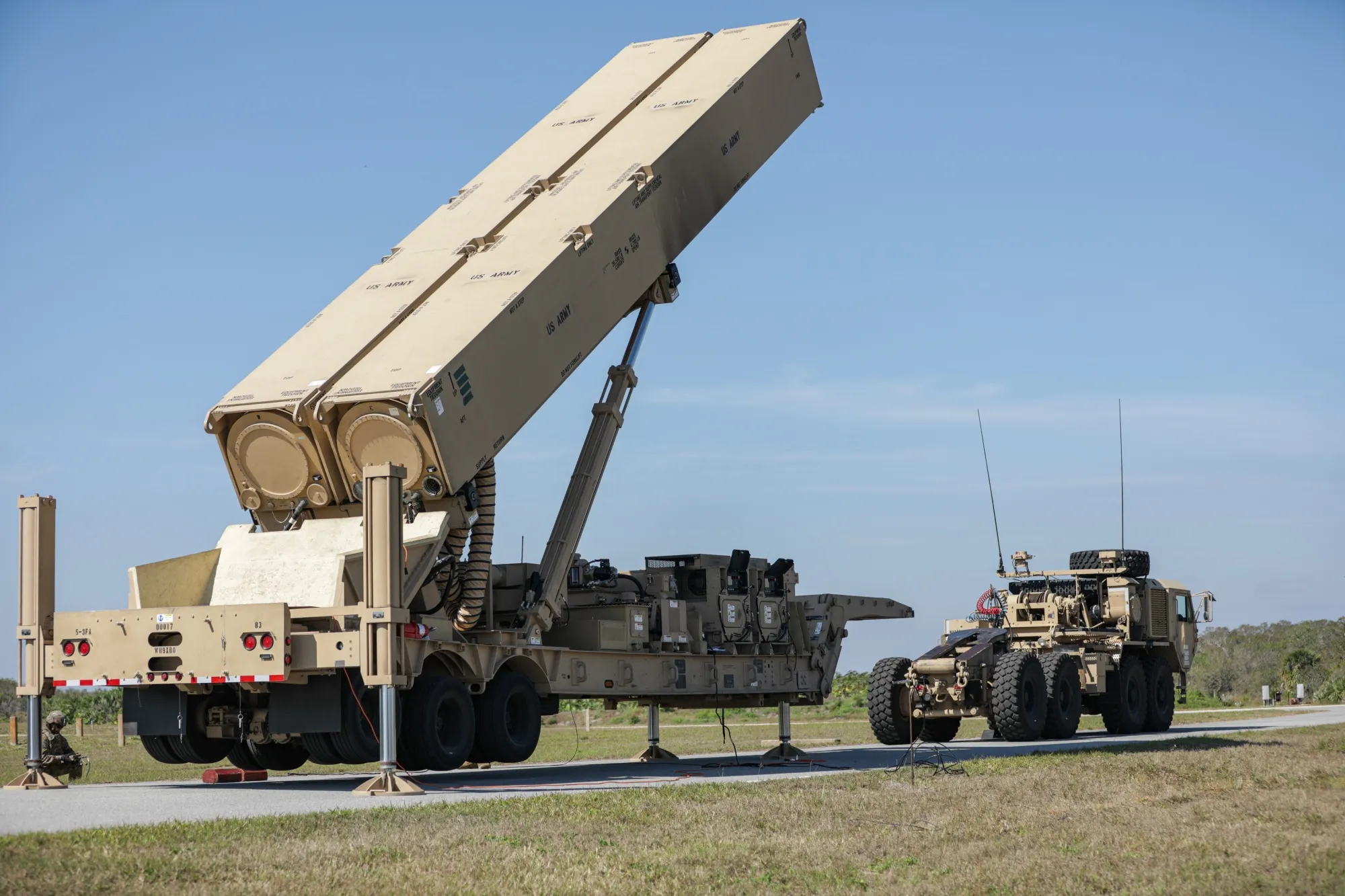 A U.S Army Soldier lifts the hydraulic launching system on the new Long-Range Hypersonic Weapon at Cape Canaveral Space Force Station, Florida.