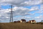 An electricity transmission tower near a residential housing estate in Rayleigh, UK.
