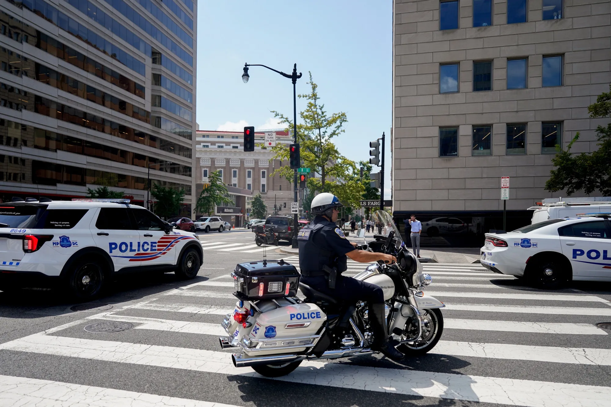 DC Metropolitan police officers during a protest near the White House on Monday after&nbsp;President Donald Trump announced he would take control of the city’s police.