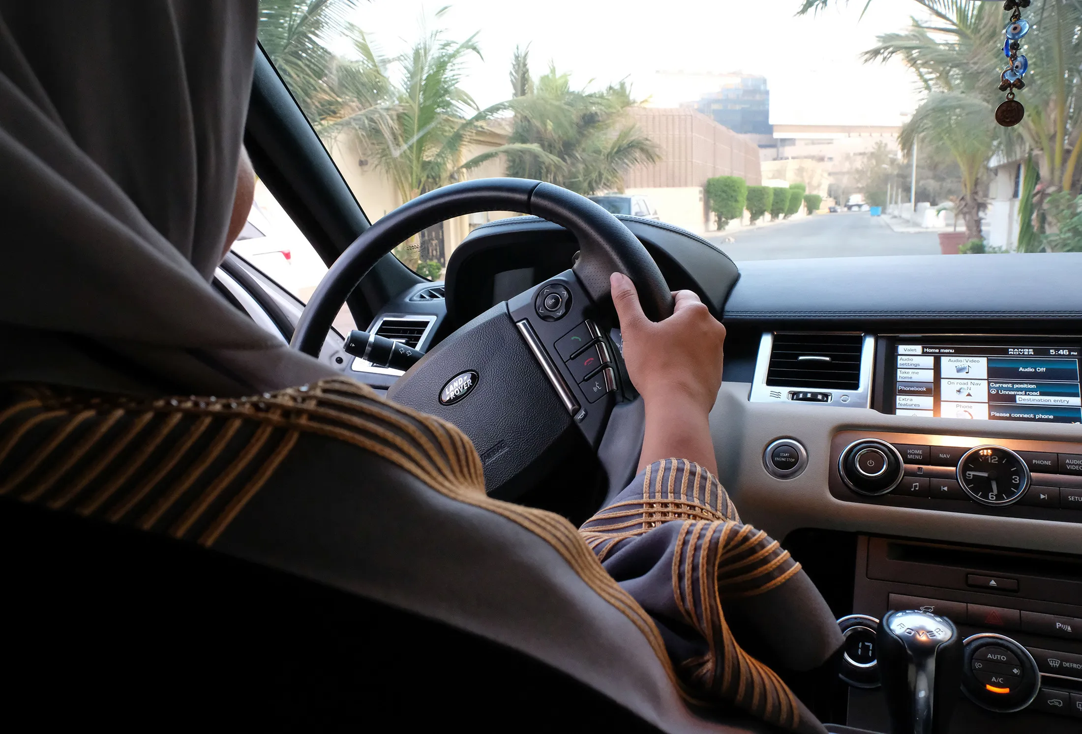 A Saudi woman drives her car along a street in the Saudi coastal city of Jeddah, on September 27, 2017.