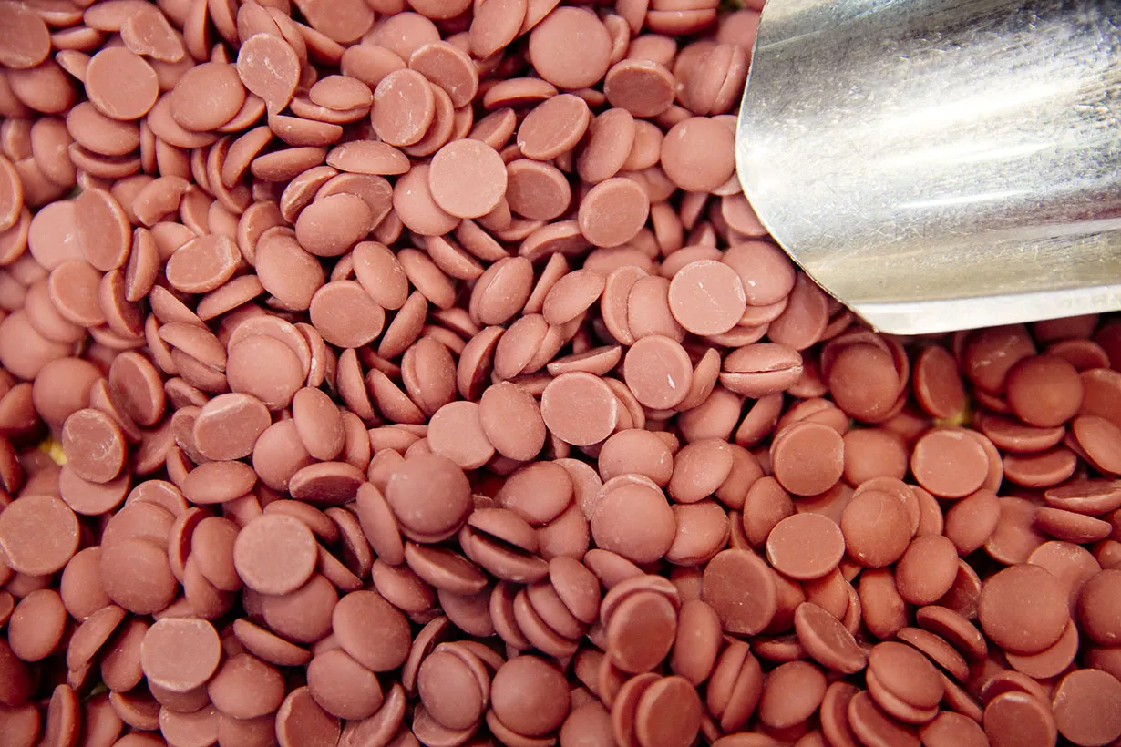 Barry Callebaut AG ruby natural chocolate discs are displayed at the Sweets &amp; Snacks Expo in Chicago, Illinois.