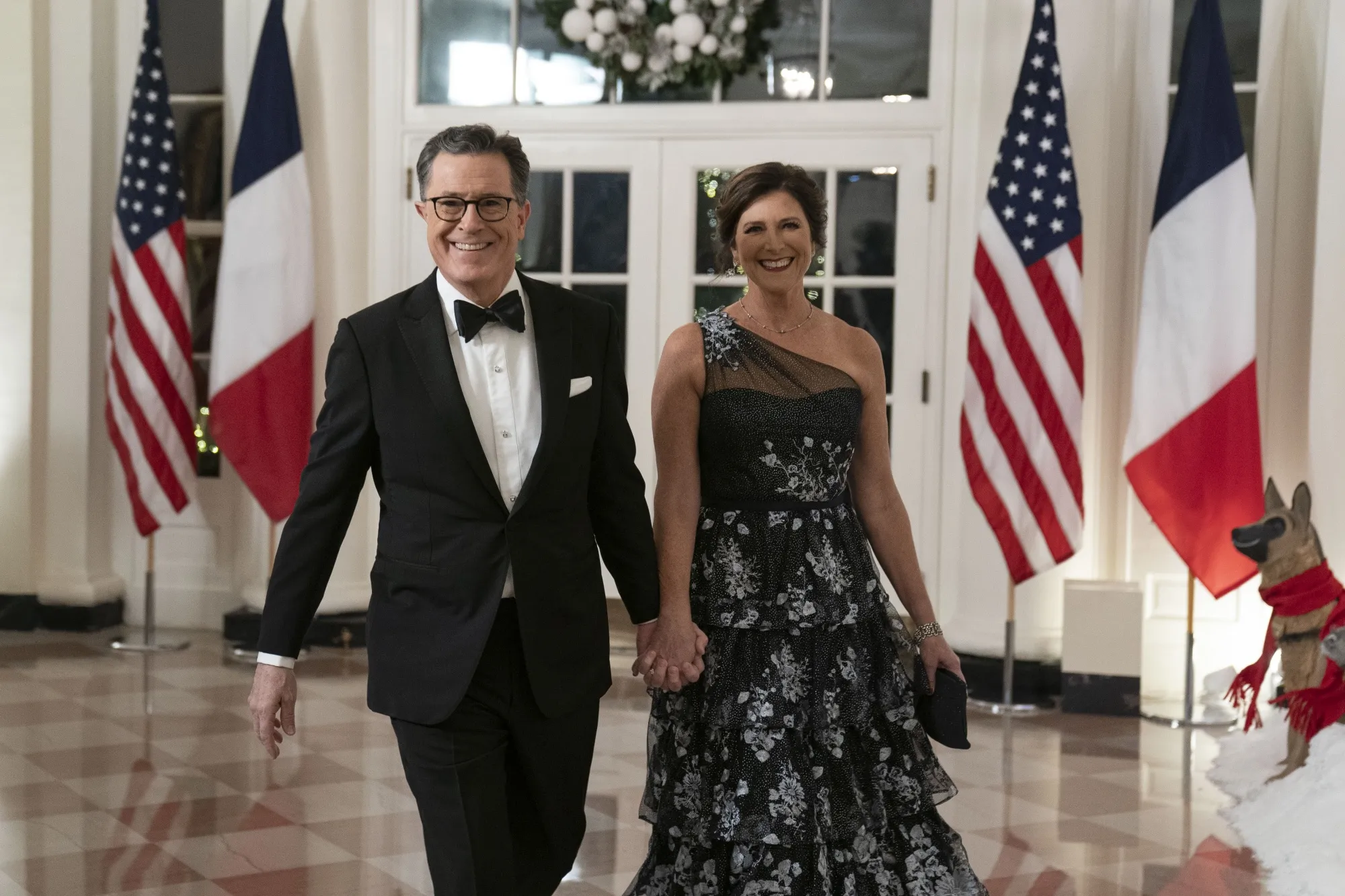 Stephen Colbert, left, and Evelyn McGee-Colbert arrive at a state dinner in Washington on Thursday, Dec. 1, 2022.