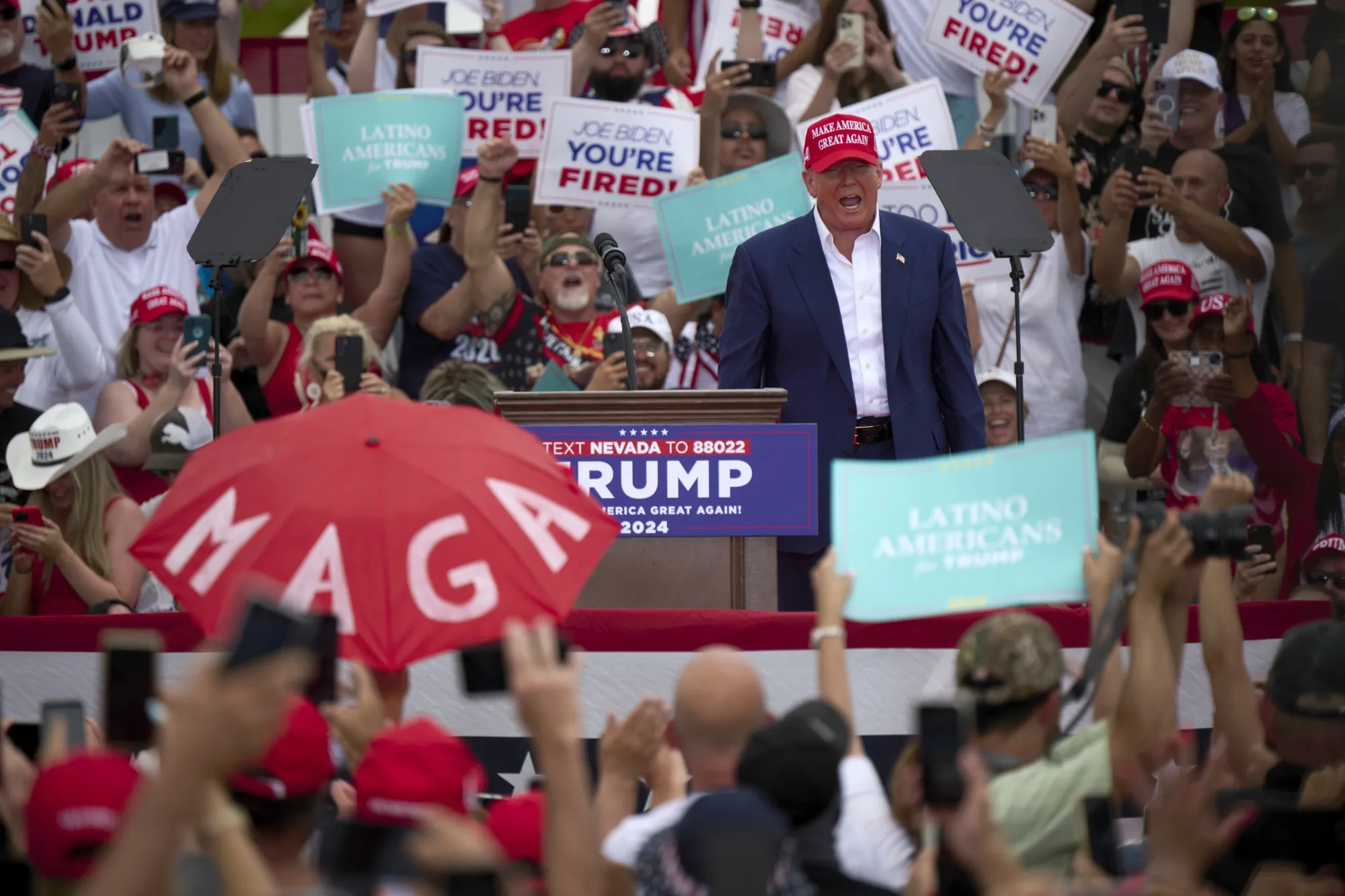 Trump arrives on stage during a campaign event at Sunset Park in Las Vegas, Nevada, on June 9.