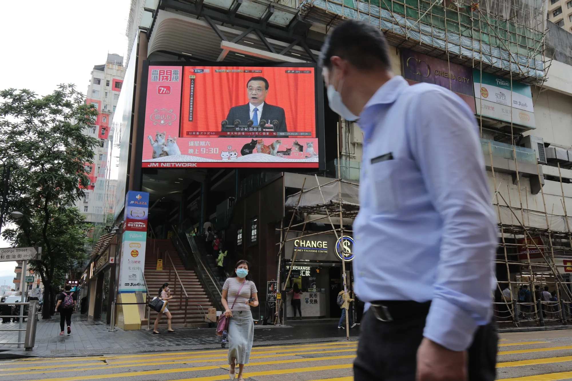 Li Keqiang speaking from the National People's Congress, in Hong Kong.