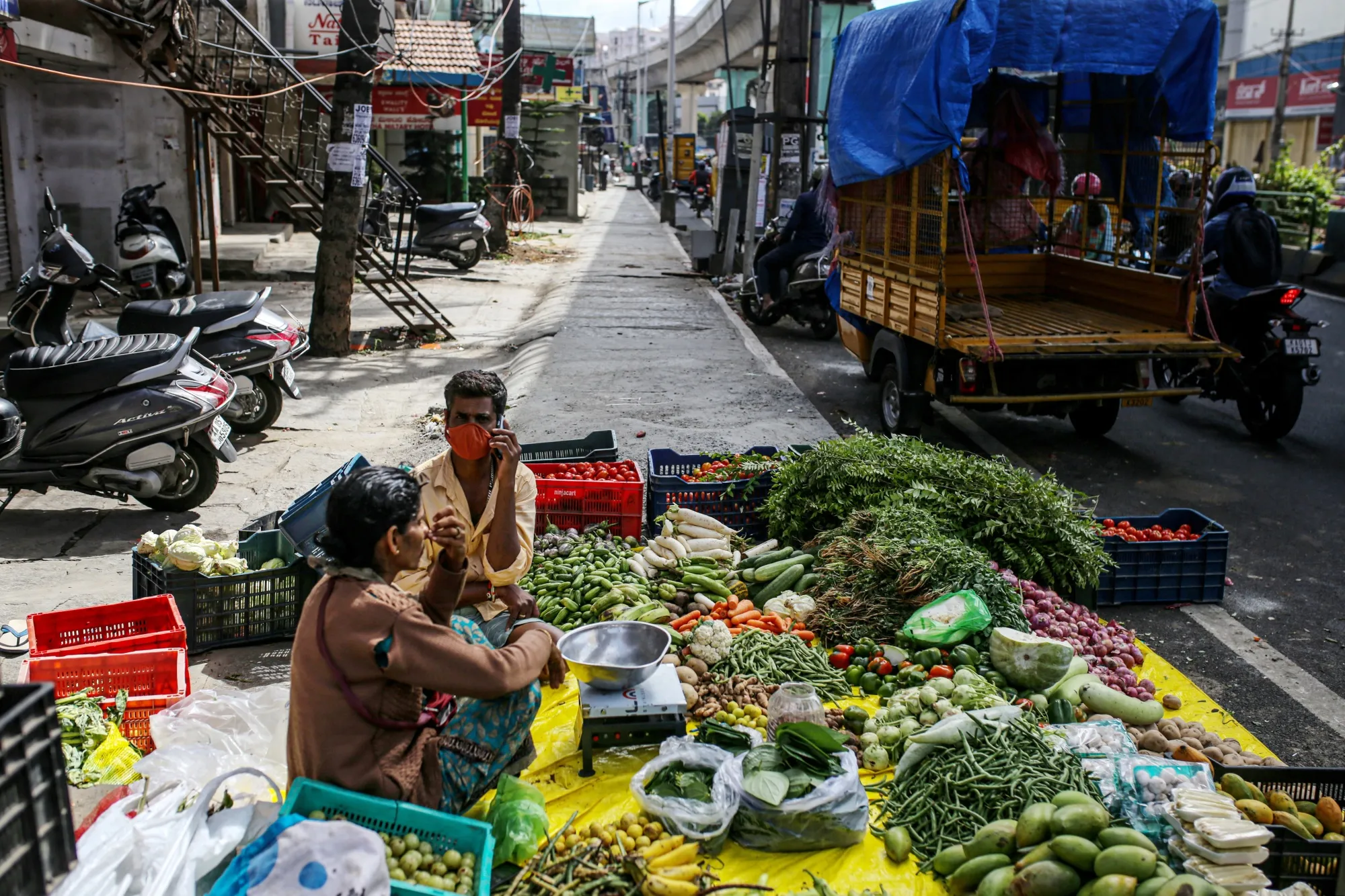 Roadside vendors sell vegetable in Bengaluru, India.