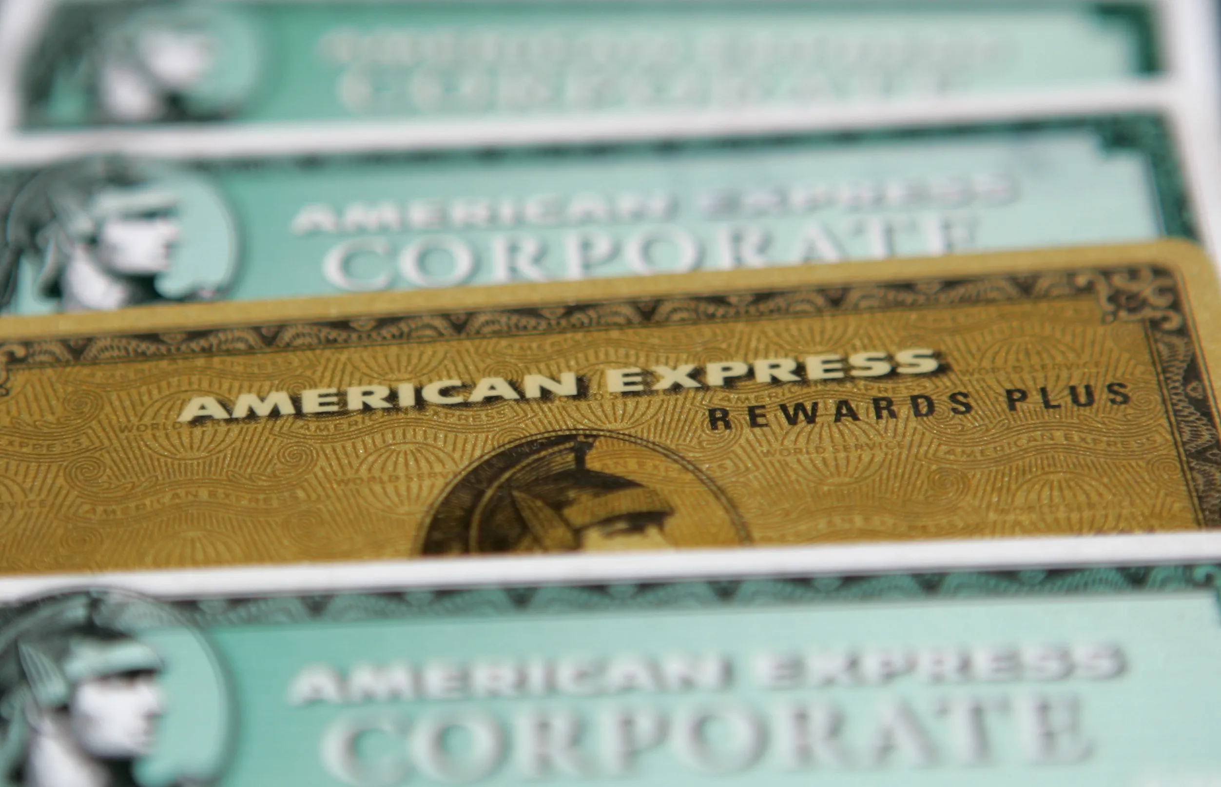 American Express credit cards are arranged in New York, Monday, Jan. 22, 2007. American Express Co., the fourth-biggest U.S. credit-card issuer, said profit rose 23 percent as defaults declined and holiday spending by cardmembers reached a record.

