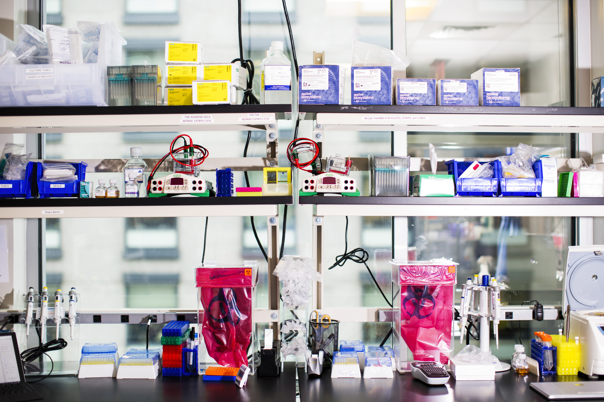 Laboratory equipment sits on shelves at the Moderna Therapeutics facility in Cambridge, Massachusetts.