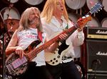 Harry Shearer, left, and Michael McKean perform as Spinal Tap in London, on July 7, 2007.
