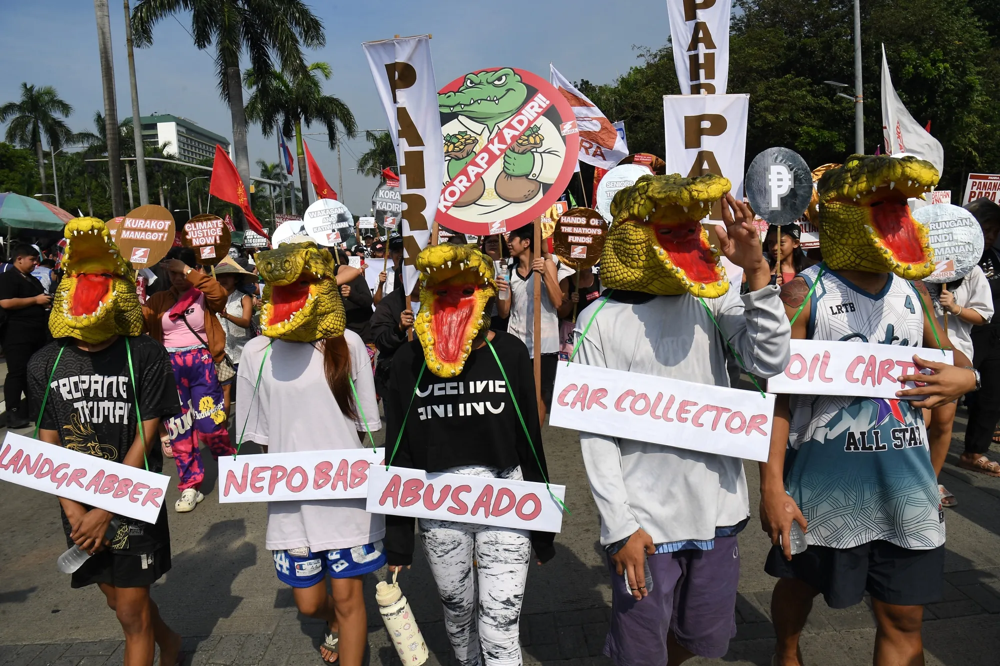 Protesters march during an anti-corruption rally in Manila on Nov. 30.