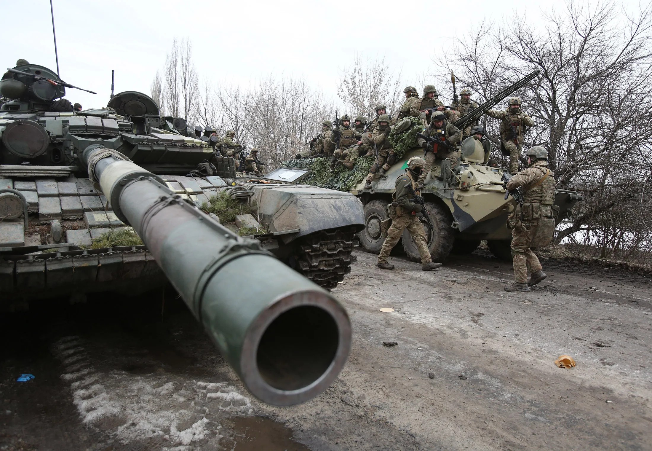 Ukrainian servicemen prepare in Ukraine's Lugansk region on Feb. 24.