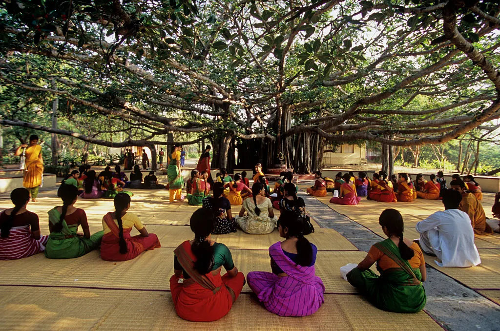 Morning prayers at a dance academy under a holy banyan tree.&nbsp;