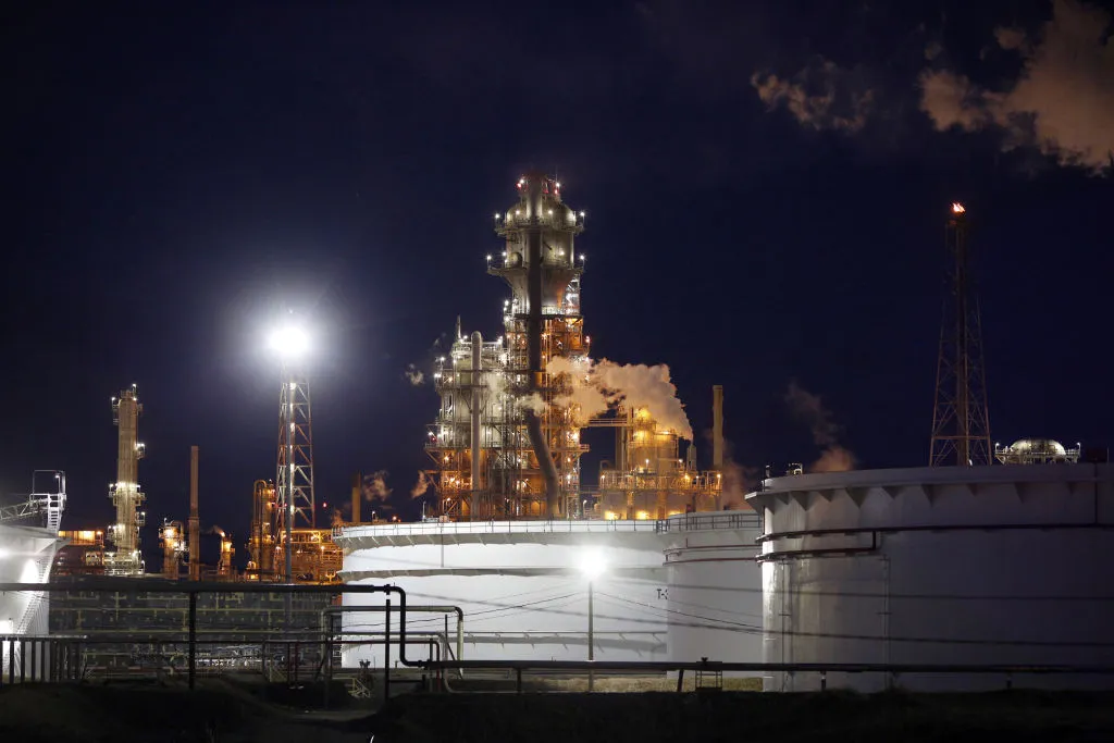 Oil storage tanks stand at a refinery&nbsp;in Norco, Louisiana.