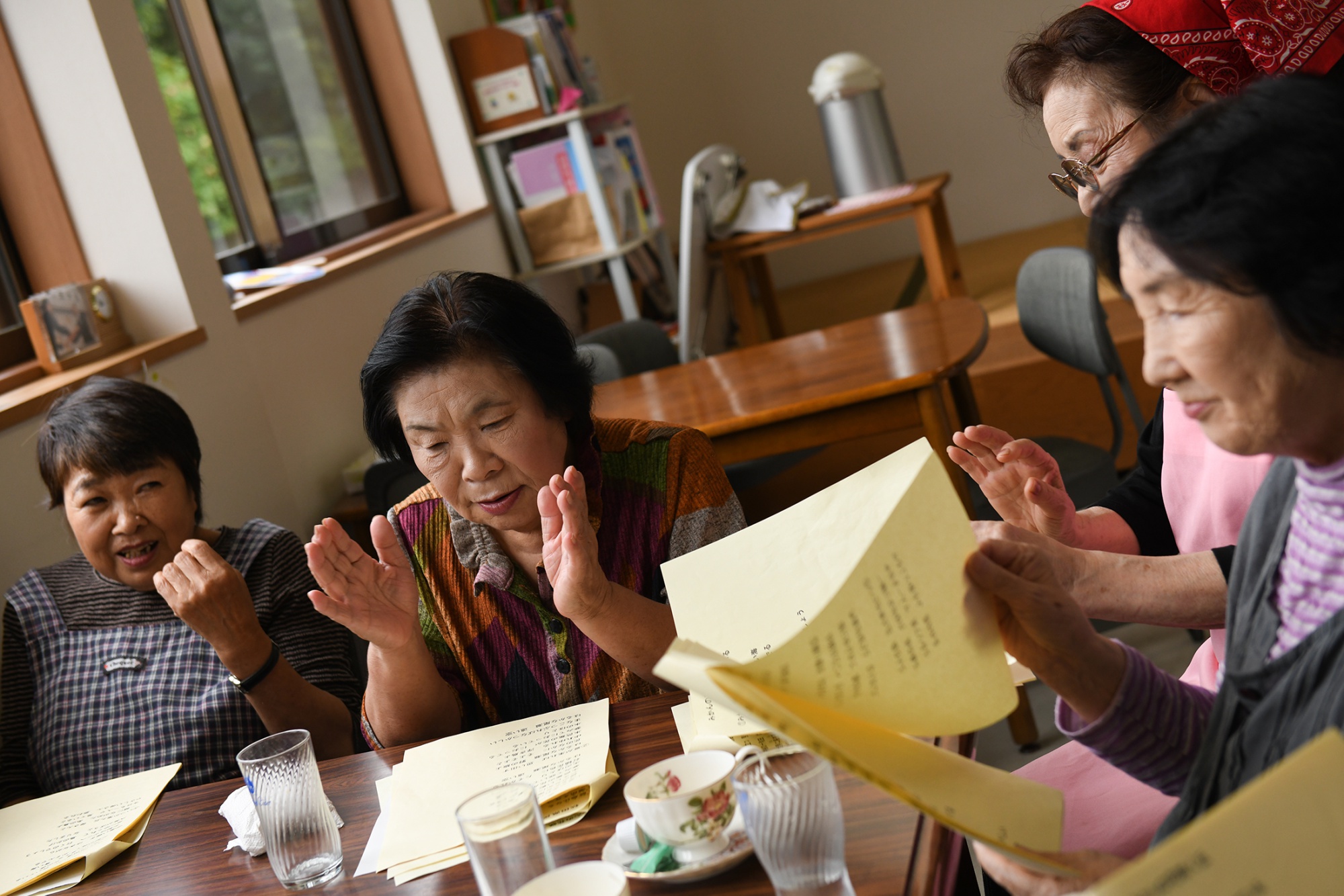 Once a week, local residents gather to eat lunch and sing together at the Misekko Asaminai grocery. 