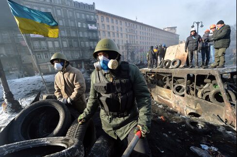 Protesters Stand on a Barricade in Kiev
