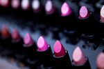 Various shades of lipstick sit on display during the opening of a Sephora store
