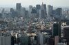 Buildings stand in the Shinjuku district of Tokyo, Japan, on Monday, March 18, 2019. Amid intense debate on Japan’s inflation target, some officials at the central bank think the 2 percent goal will probably remain out of reach for the next three years, according to people familiar with the matter.