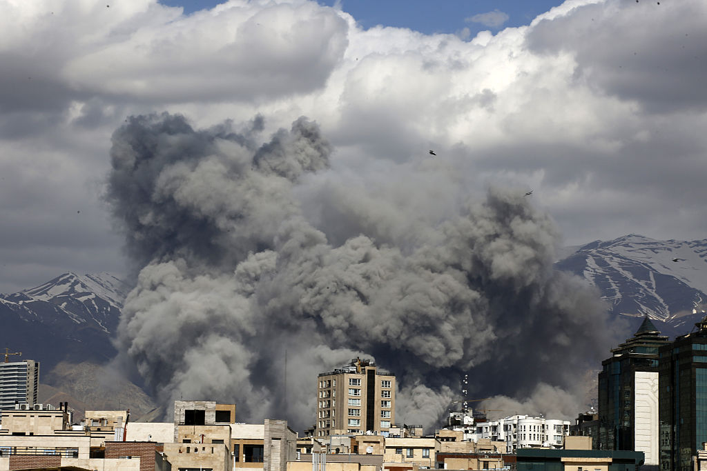 Smoke rises from the area after it was targeted in attacks as a series of explosions are heard in Tehran, Iran on March 1.