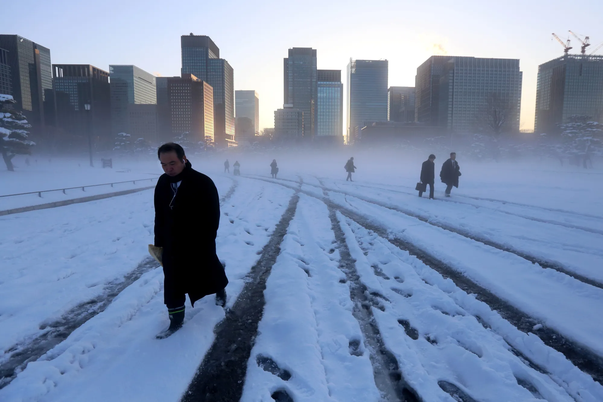 Tokyo's Business District as Snow Covered The Japanese Capital 