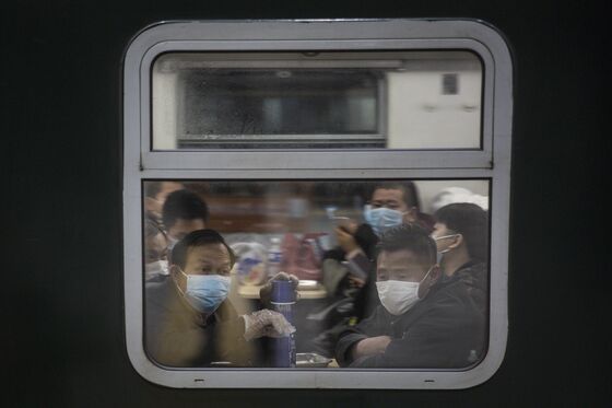 Residents Rush Trains, Take to Highways as Wuhan Lifts Lockdown