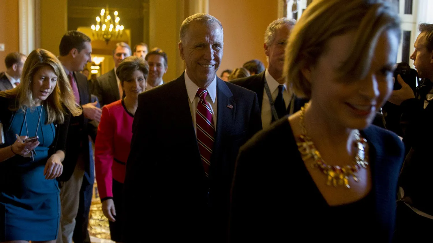 Senator-elect Thom Tillis, a Republican from North Carolina, center, walks through the U.S. Capitol Building during a tour in Washington, D.C., U.S., on Wednesday, Nov. 12, 2014.

