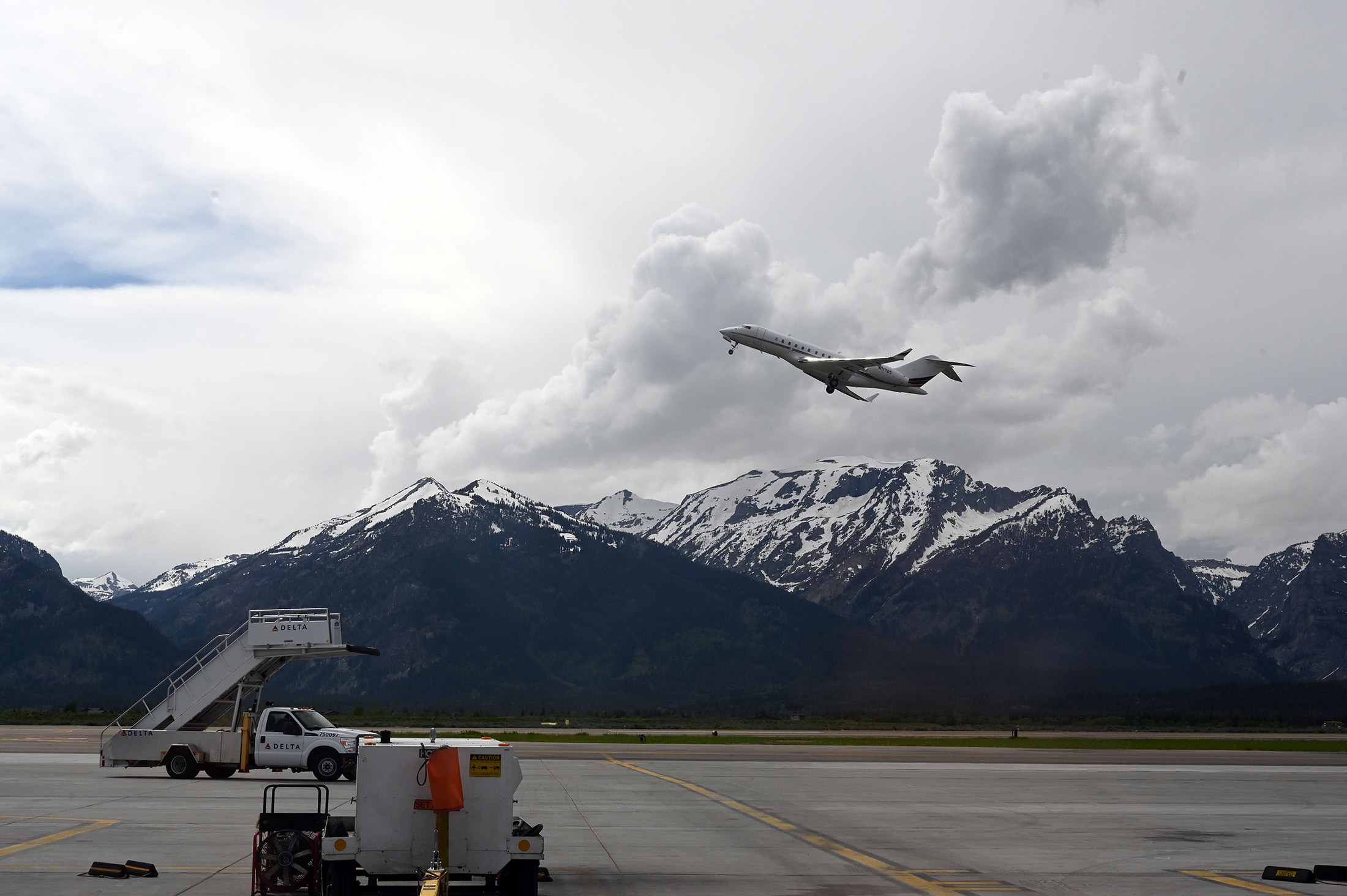 A private jet takes off from Jackson Hole Airport in Grand Teton National Park, Wyo., on June 13, 2019.