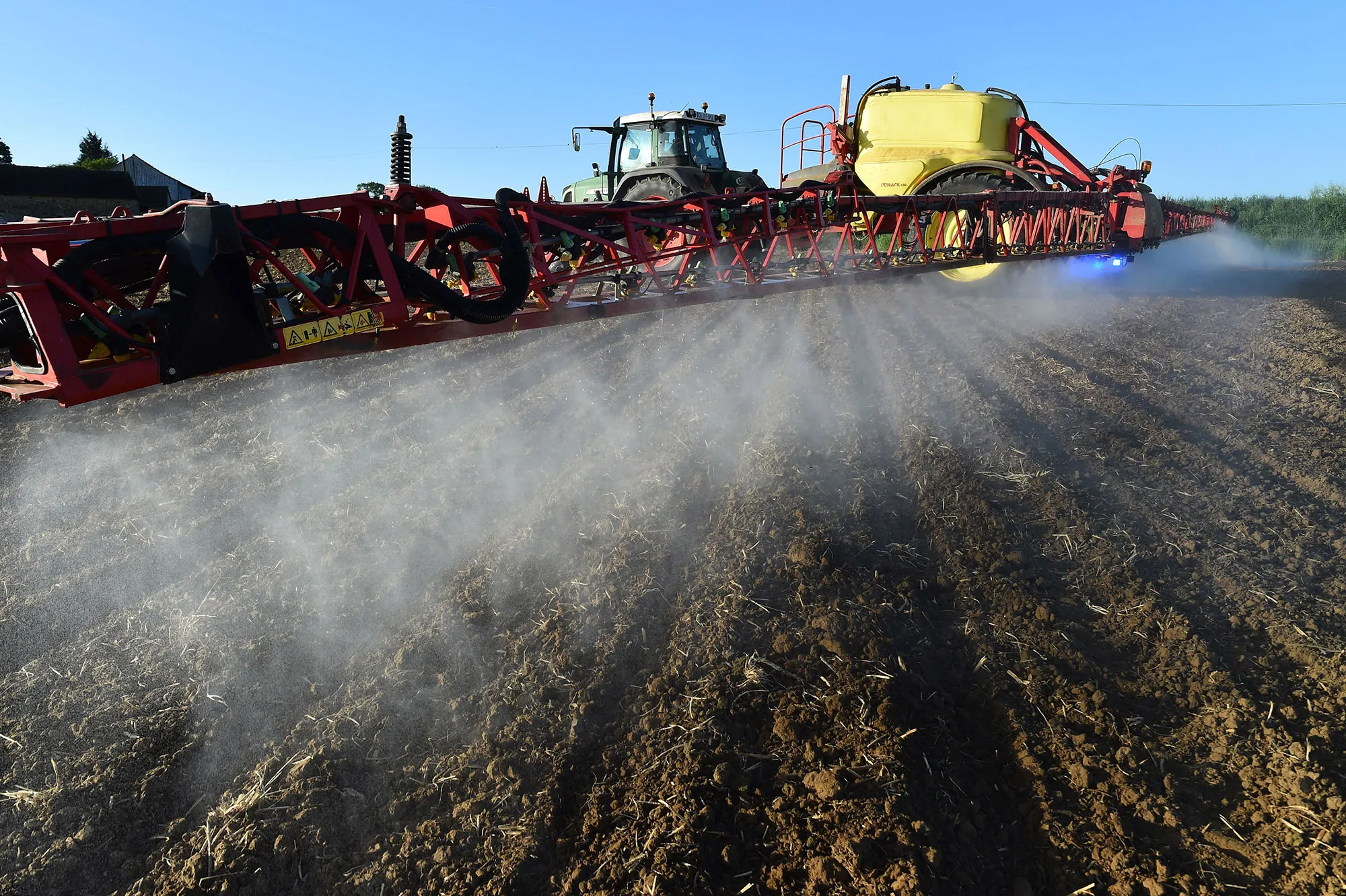 A farmer spreads fertilizer&nbsp;in Piace, France.&nbsp;