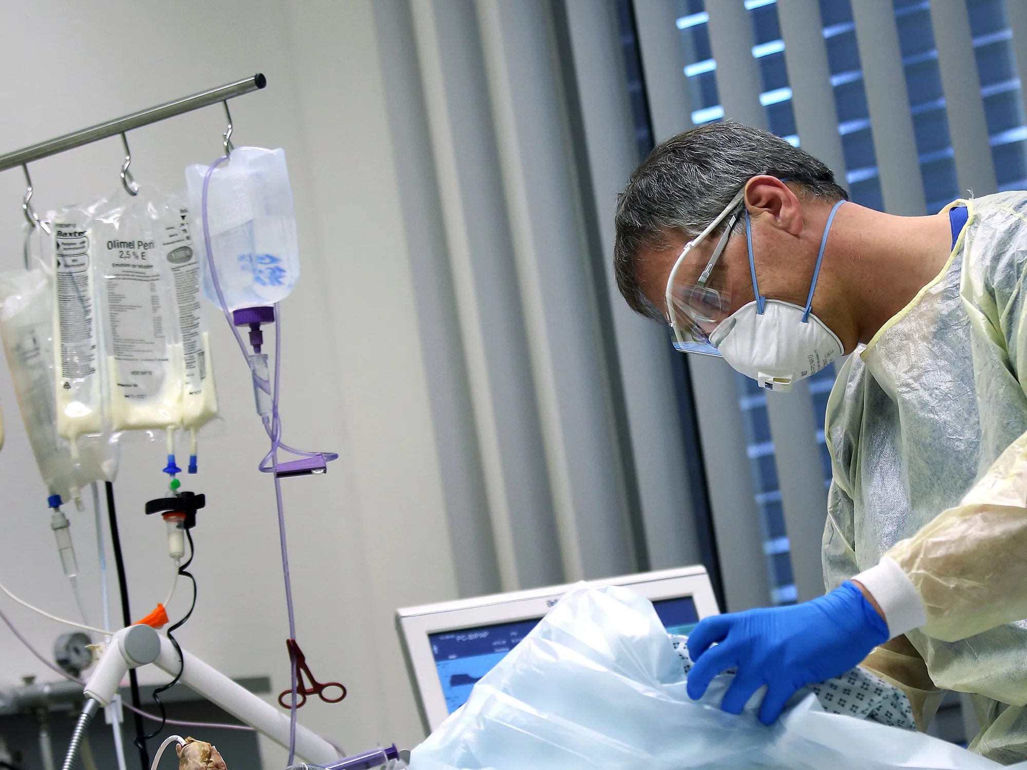 A ICU physician treats a Covid-19 patient at a hospital in Magdeburg, Germany, on April 16.