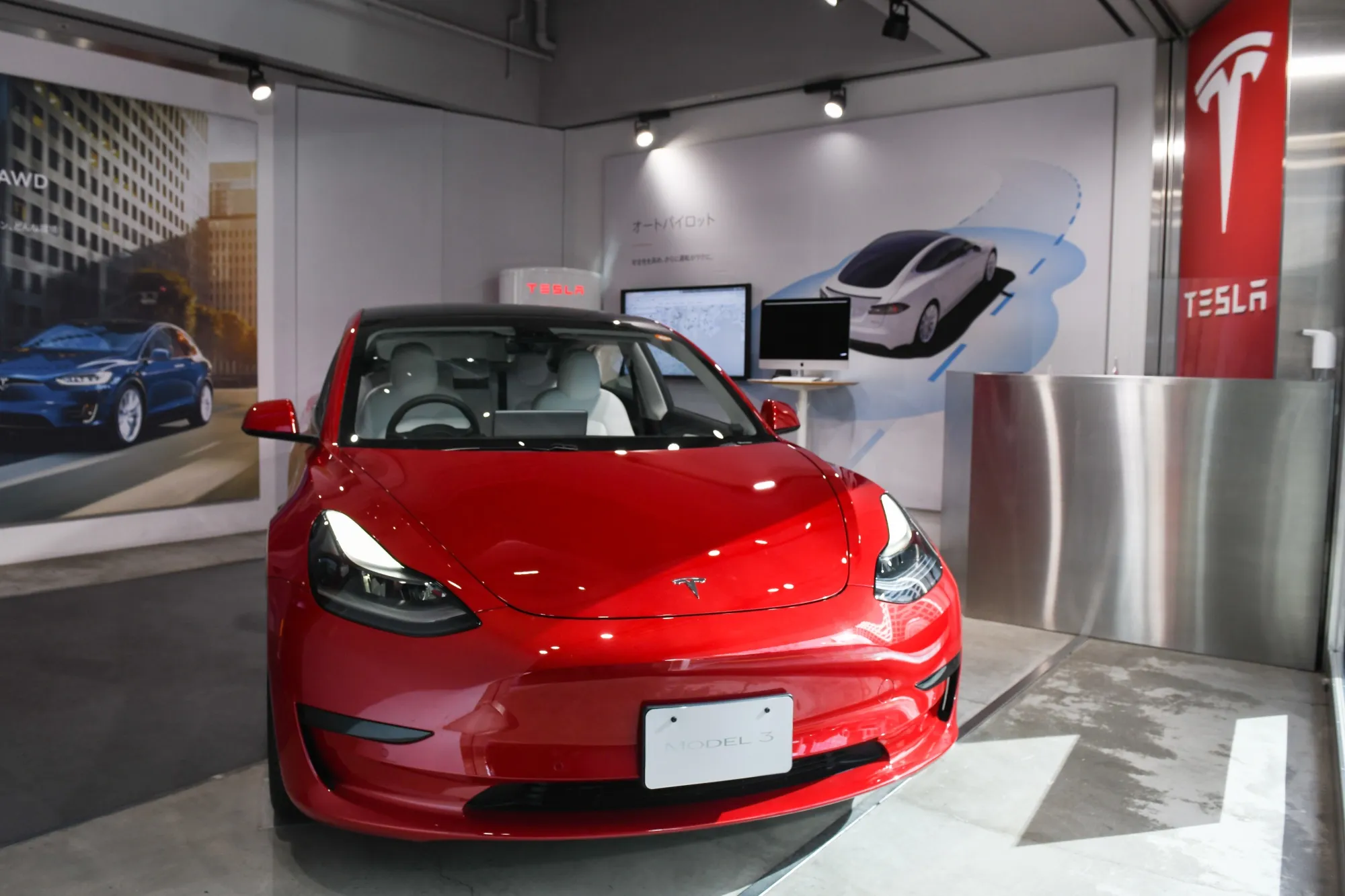 A Tesla Model 3&nbsp;inside the company's showroom in&nbsp;Shibuya.