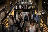 Commuters at the Times Square subway station in New York. 