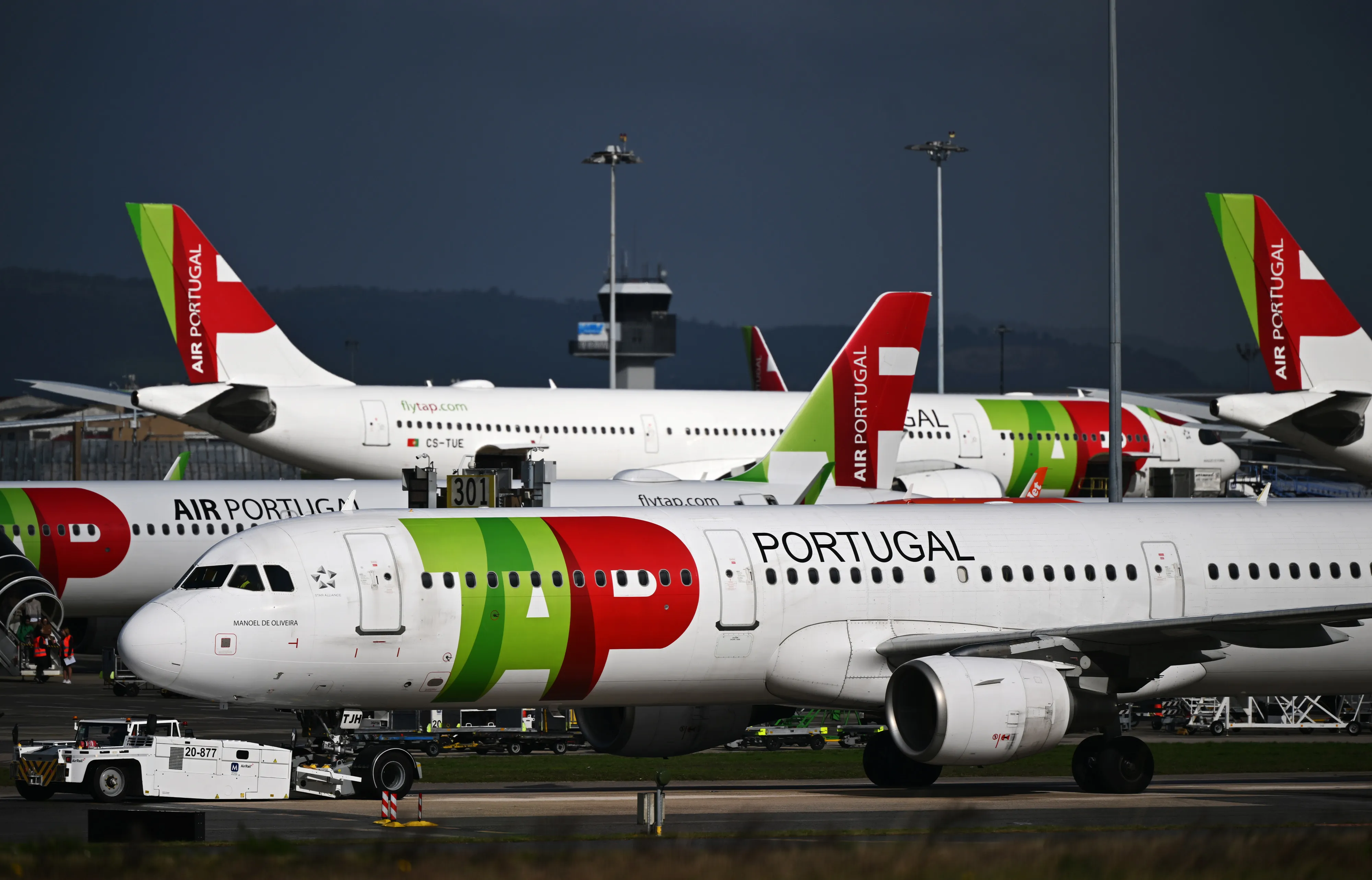 TAP passenger aircraft on the tarmac at Humberto Delgado airport in Lisbon.