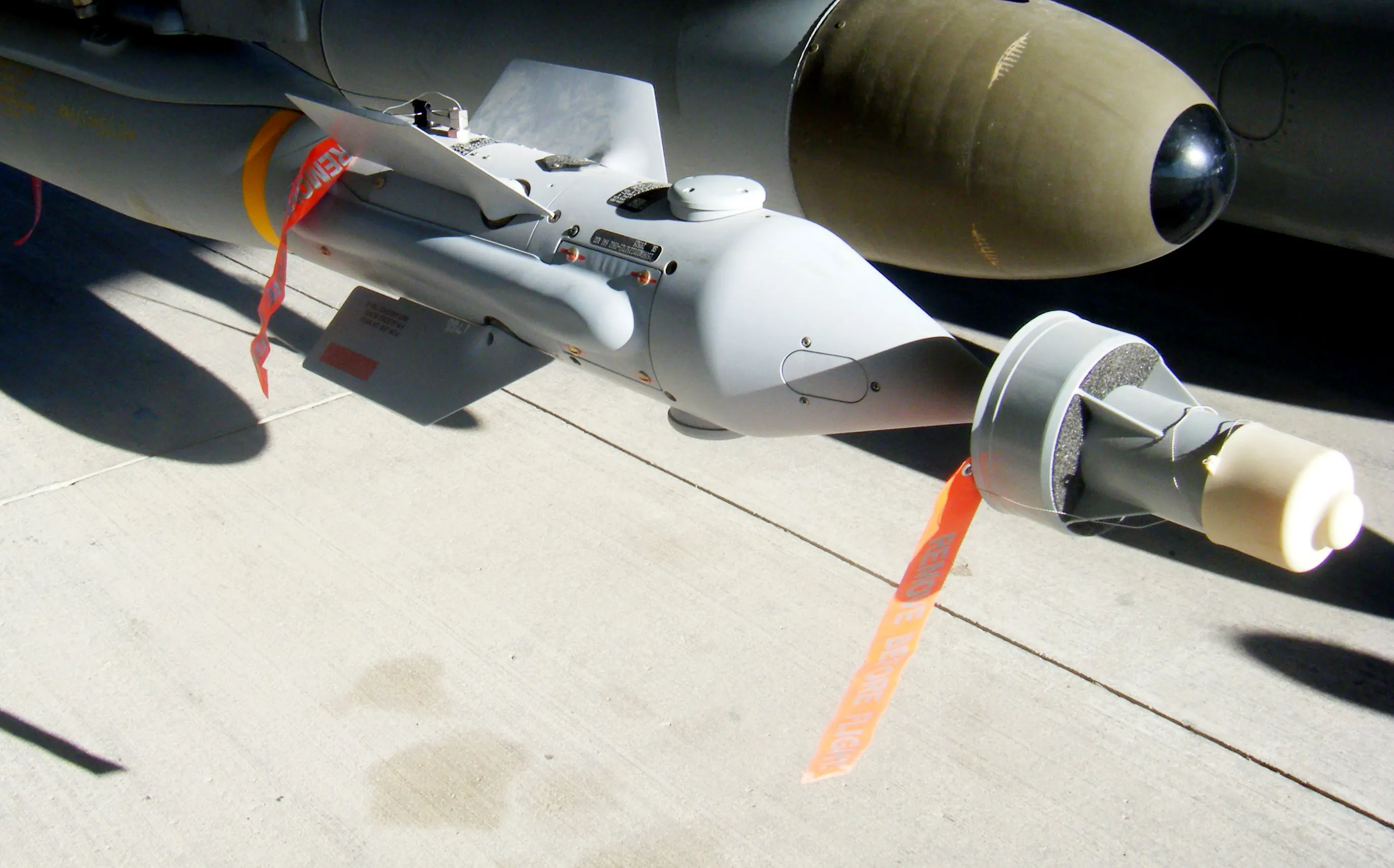A Paveway laser-guided bomb, built by Raytheon beneath an RAF Harrier GR9.
