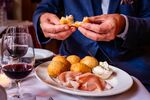 At Brutto, coccoli, the fried dough snack, is served with prosciutto.