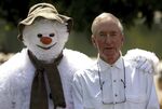 File photo of author Raymond Briggs in Hyde Park, London. Author and illustrator Raymond Briggs, who is best known for the 1978 classic The Snowman, has died aged 88, his publisher Penguin Random House said Wednesday Aug. 10, 2022. (Anthony Devlin/PA via AP)