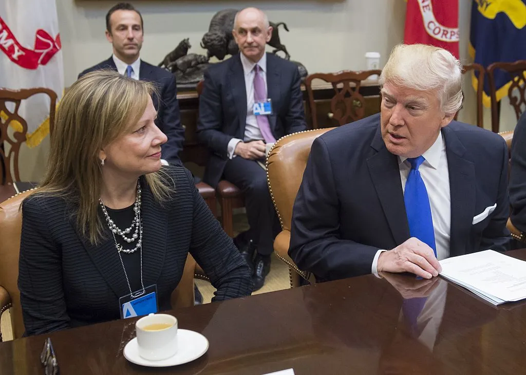 Trump speaks with General Motors CEO Mary Barra, in happier times.