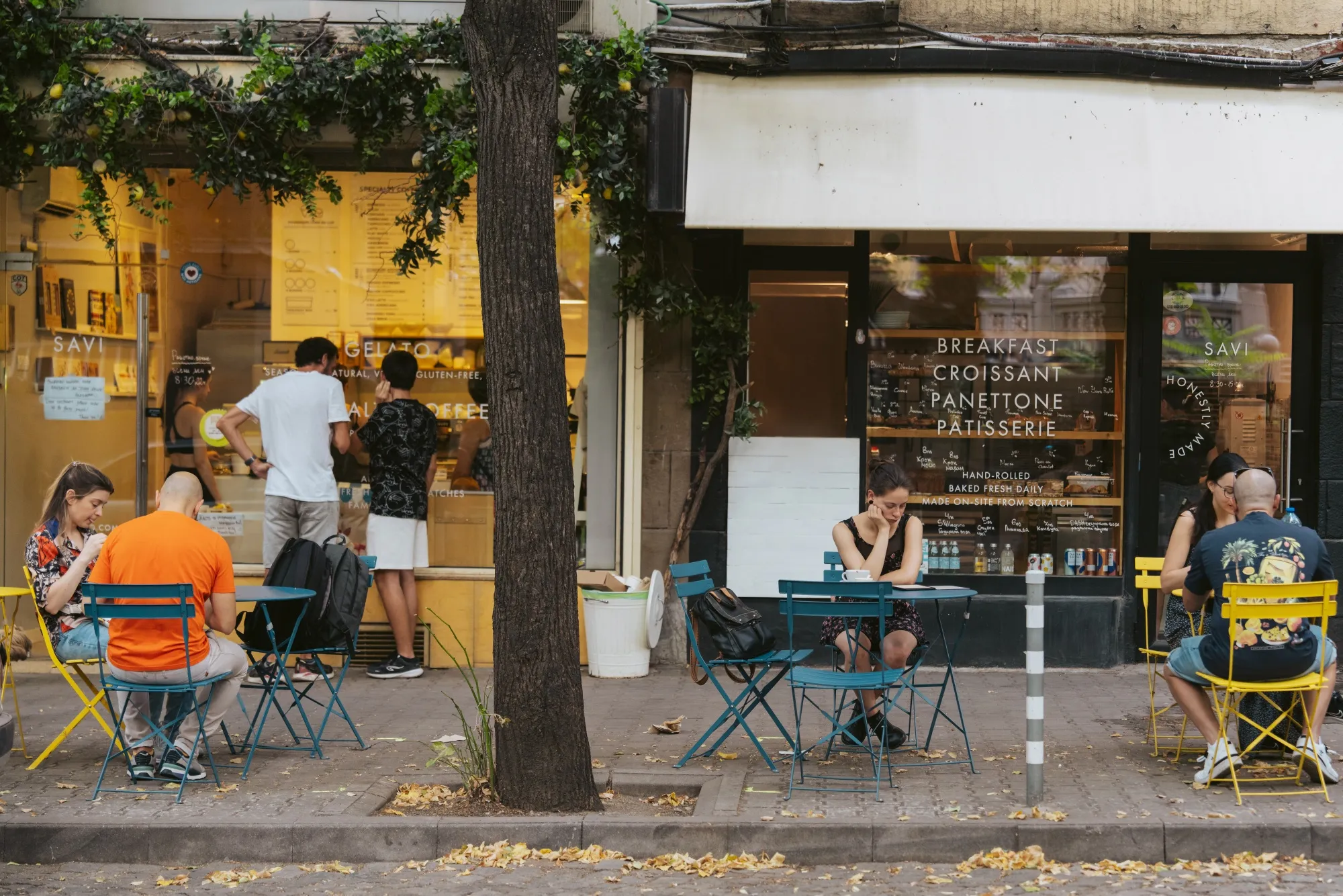 Customers at outdoor cafe tables in Sofia, Bulgaria.