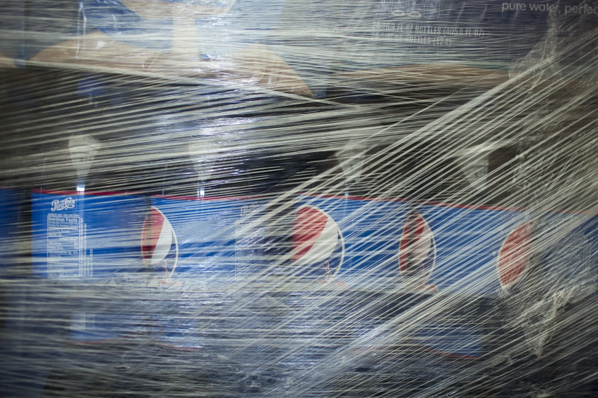 Pallets of soda wrapped in plastic in Phoenix.