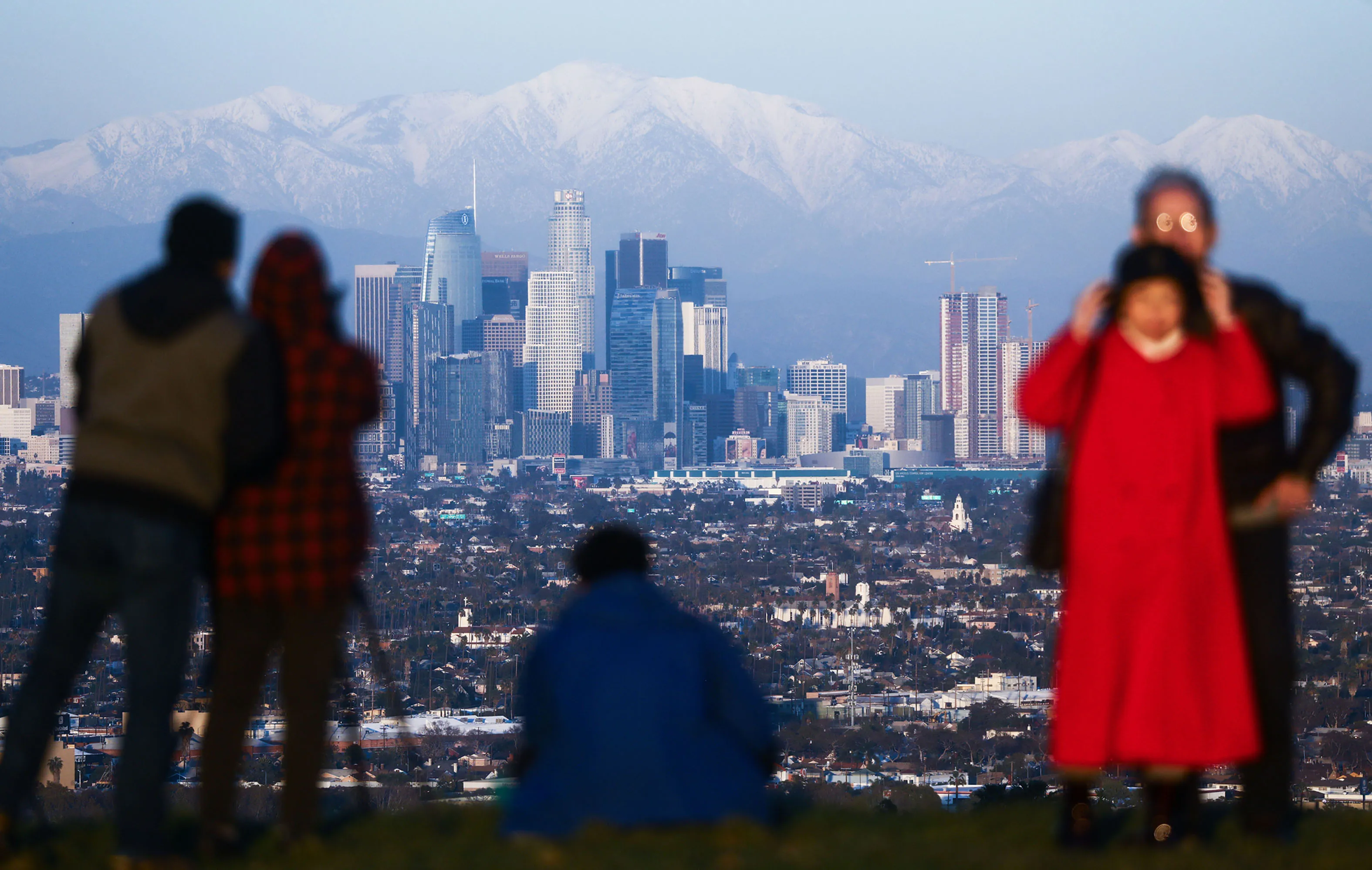 Mountains rise behind the downtown skyline&nbsp;of&nbsp;Los Angeles