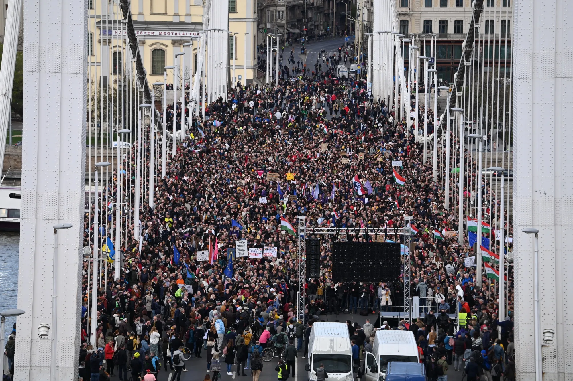 Protesters take part in a rally on the Erzsebet Bridge in Budapest on April 1.