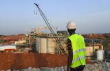 A worker looks at the site of the Ity Gold Mine during the inauguration in 2019.