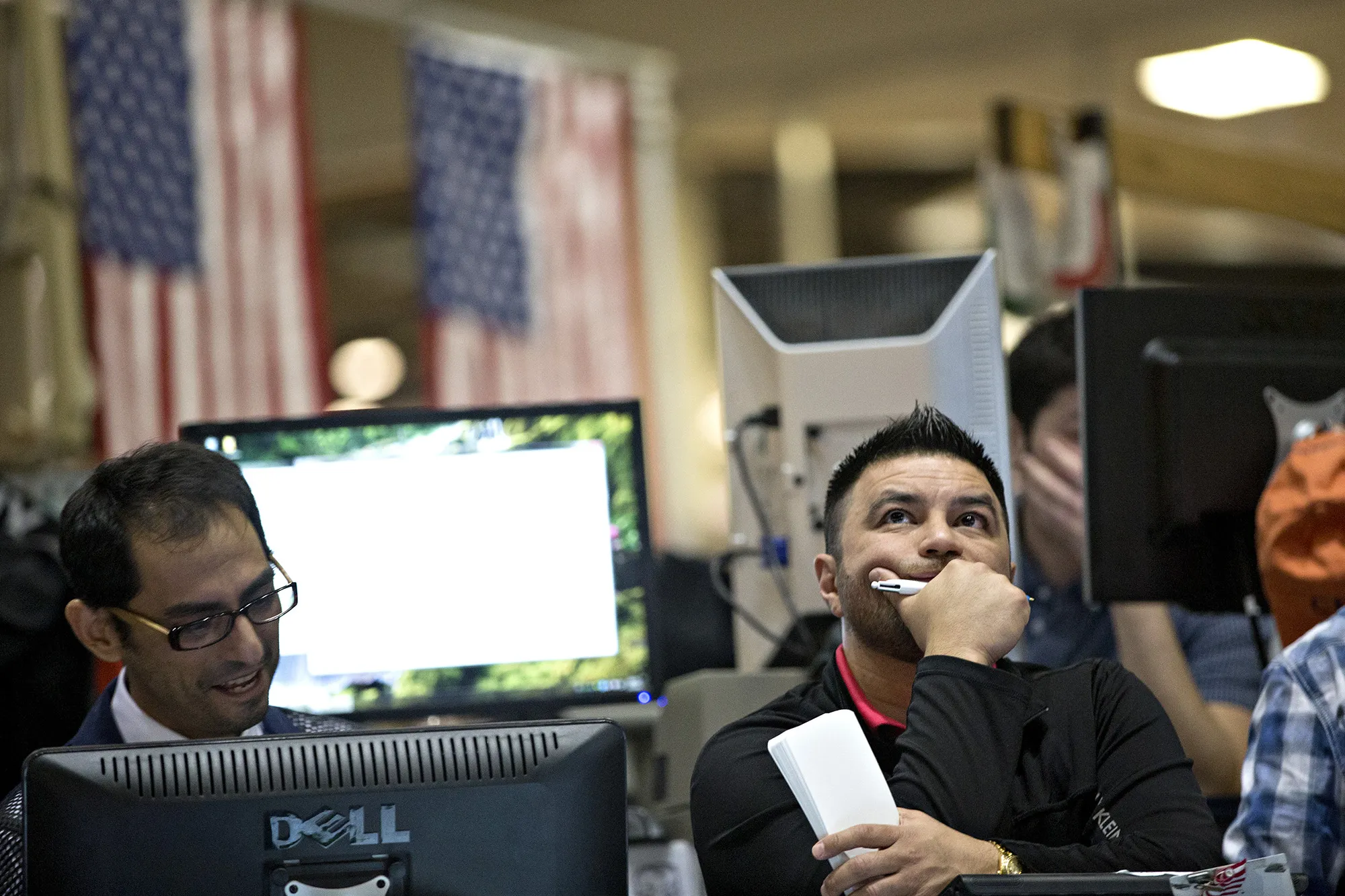 Traders work in the Cboe Volatility Index pit on the floor of the Cboe Global Markets Inc. building in Chicago.