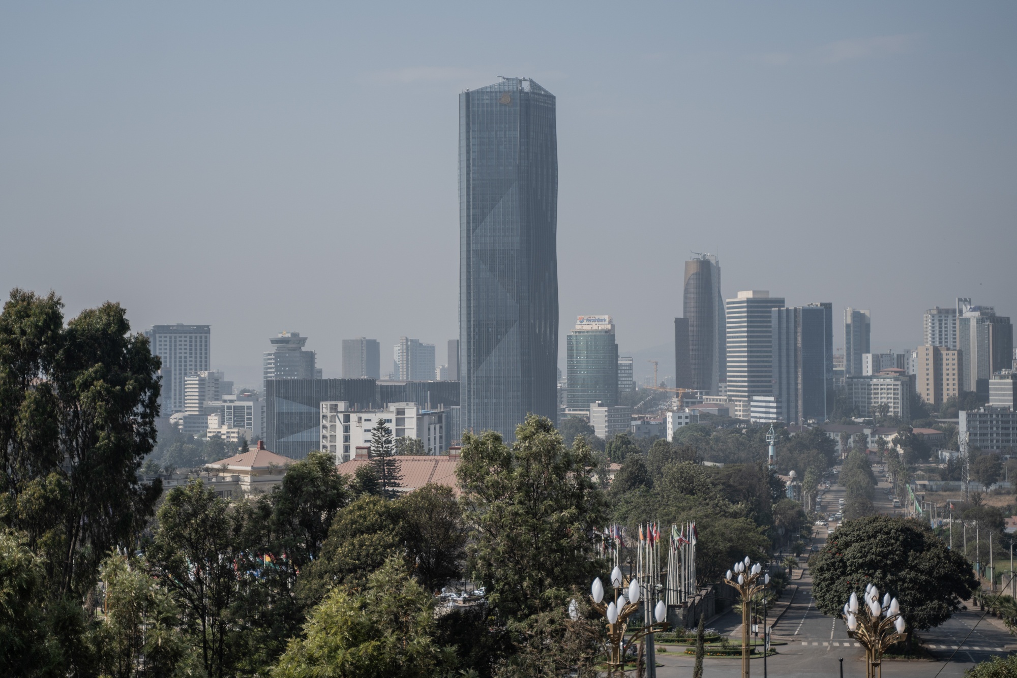 The headquarter building of The Commercial Bank of Ethiopia, center, in the financial district in Addis Ababa, Ethiopia, on Thursday, Jan. 9, 2025. Ethiopia is opening a stock exchange after a five-decade gap, in its latest step to lure investors to a nation that's struggling to control regional strife as it recovers from a civil war. Photographer: Amanuel Sileshi/Bloomberg