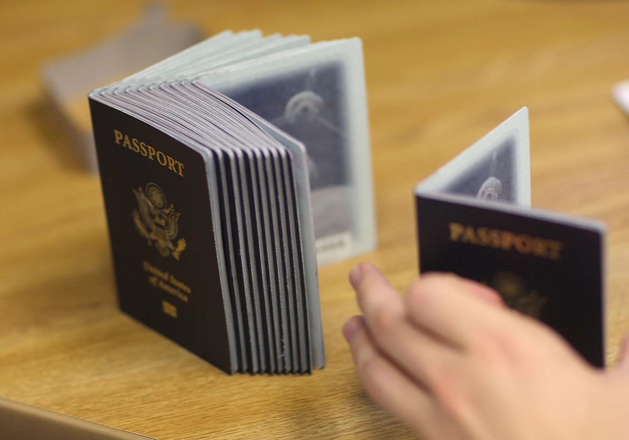 A stack of blank passports at the Miami Passport Agency.